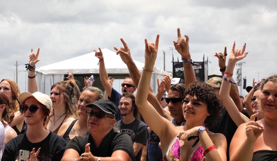 Fans rock to the bandsa at the 2022 Welcome to Rockville music festival. The event returns May 18-21 to Daytona International Speedway.