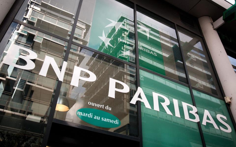 BNP Paribas is among the banks raided in France - LOIC VENANCE/AFP via Getty Images