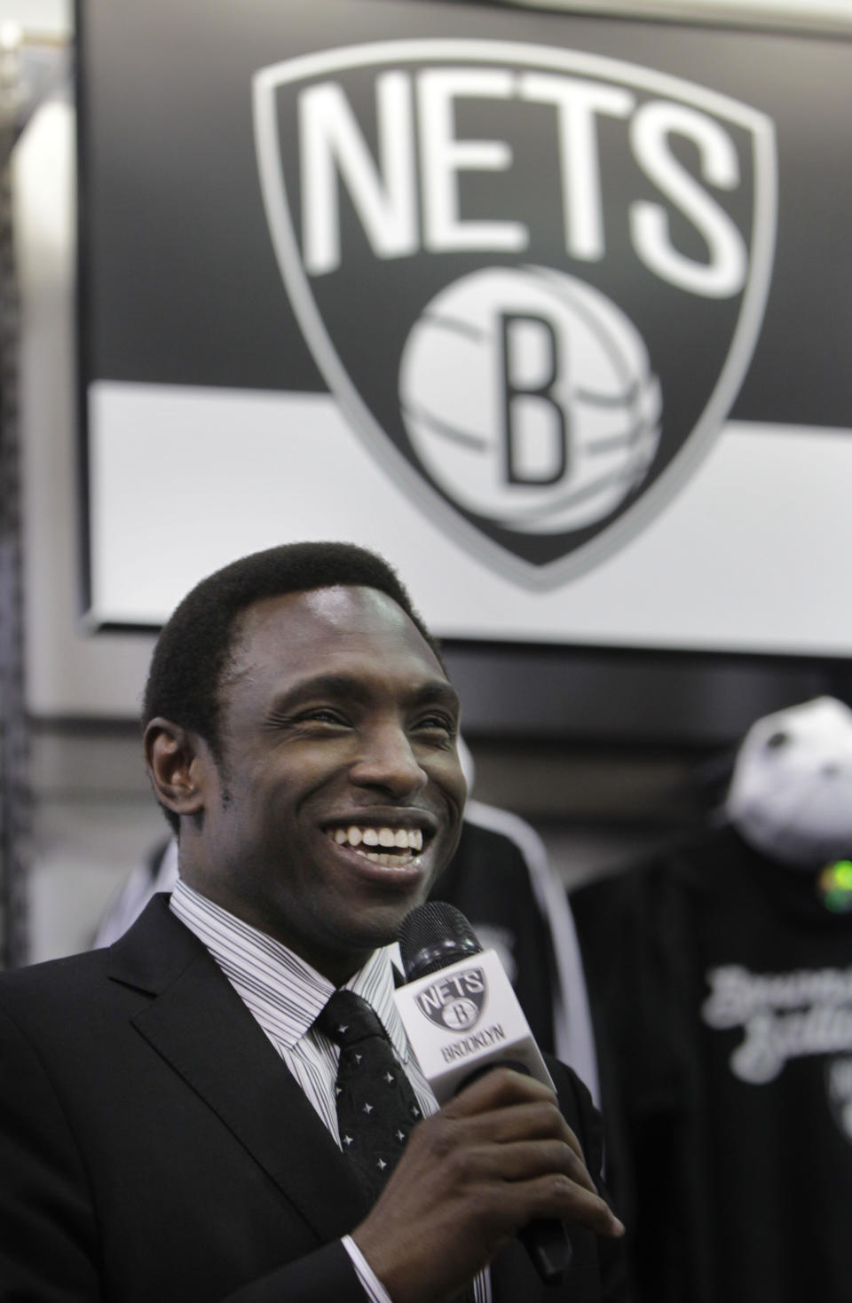 Brooklyn Nets basketball coach Avery Johnson speaks during a news conference to unveil the new team logo, in the Brooklyn borough of New York, Monday, April 30, 2012. The Nets will be moving from New Jersey to the new Barclays Center in Brooklyn, New York for the 2012-2013 NBA basketball season. (AP Photo/Seth Wenig)