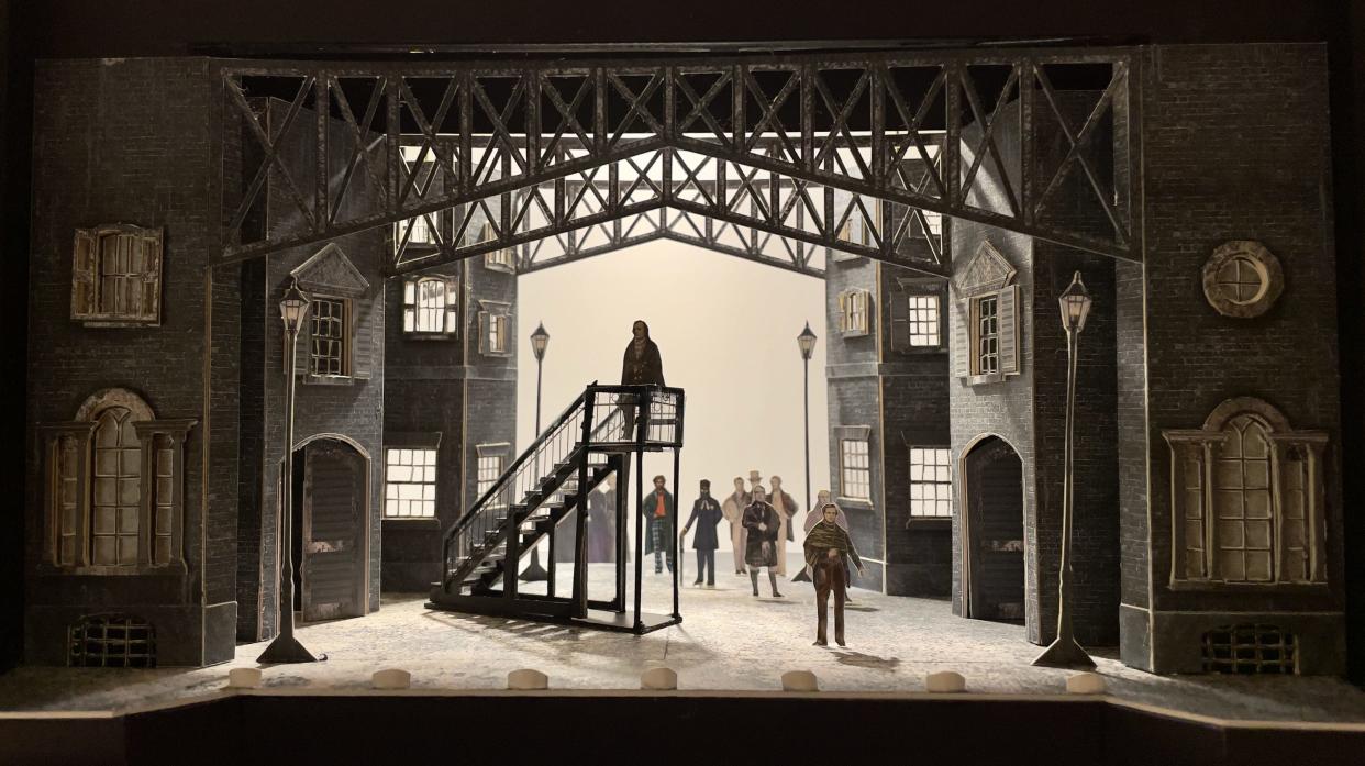 A street scene from the Playhouse in the Park’s new adaptation of Charles Dickens’ “A Christmas Carol.” The scenic design is by Wilson Chin.