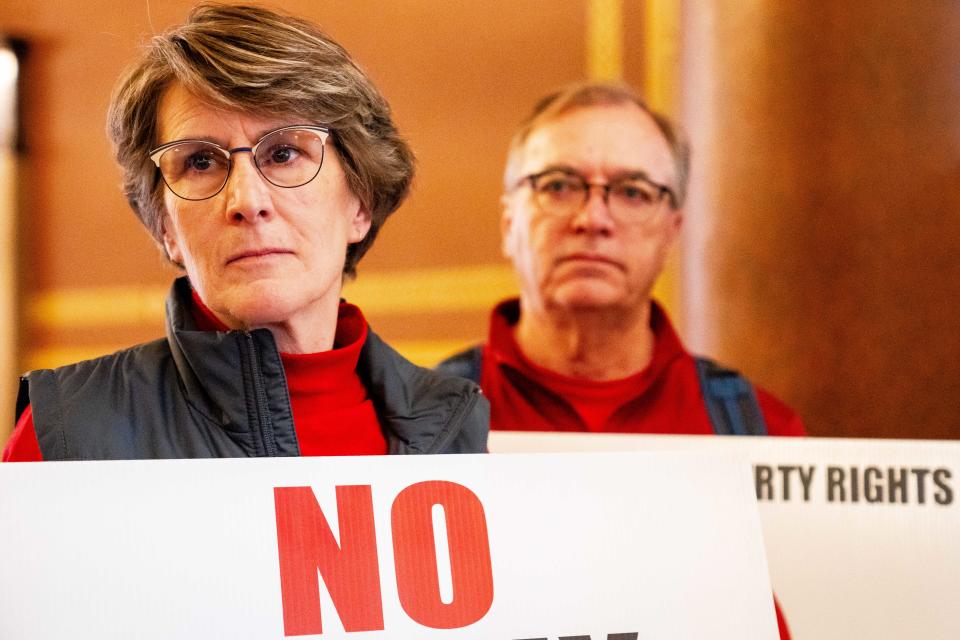 Wright County farmers Julie and Paul Glade  during a rally against carbon capture pipelines in January at the Iowa Capitol.