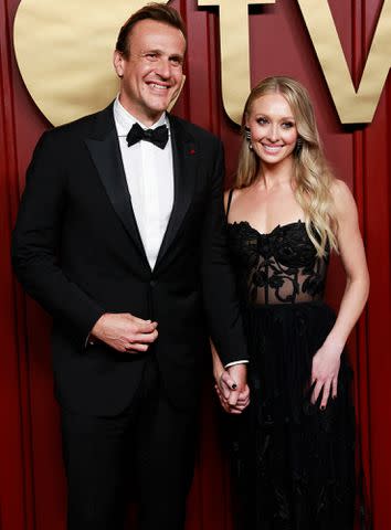 <p>MICHAEL TRAN/AFP/Getty</p> Jason Segel and Kayla Radomski attend the Apple TV+ 75th Emmy Awards red carpet event in Los Angeles on January 15, 2024.