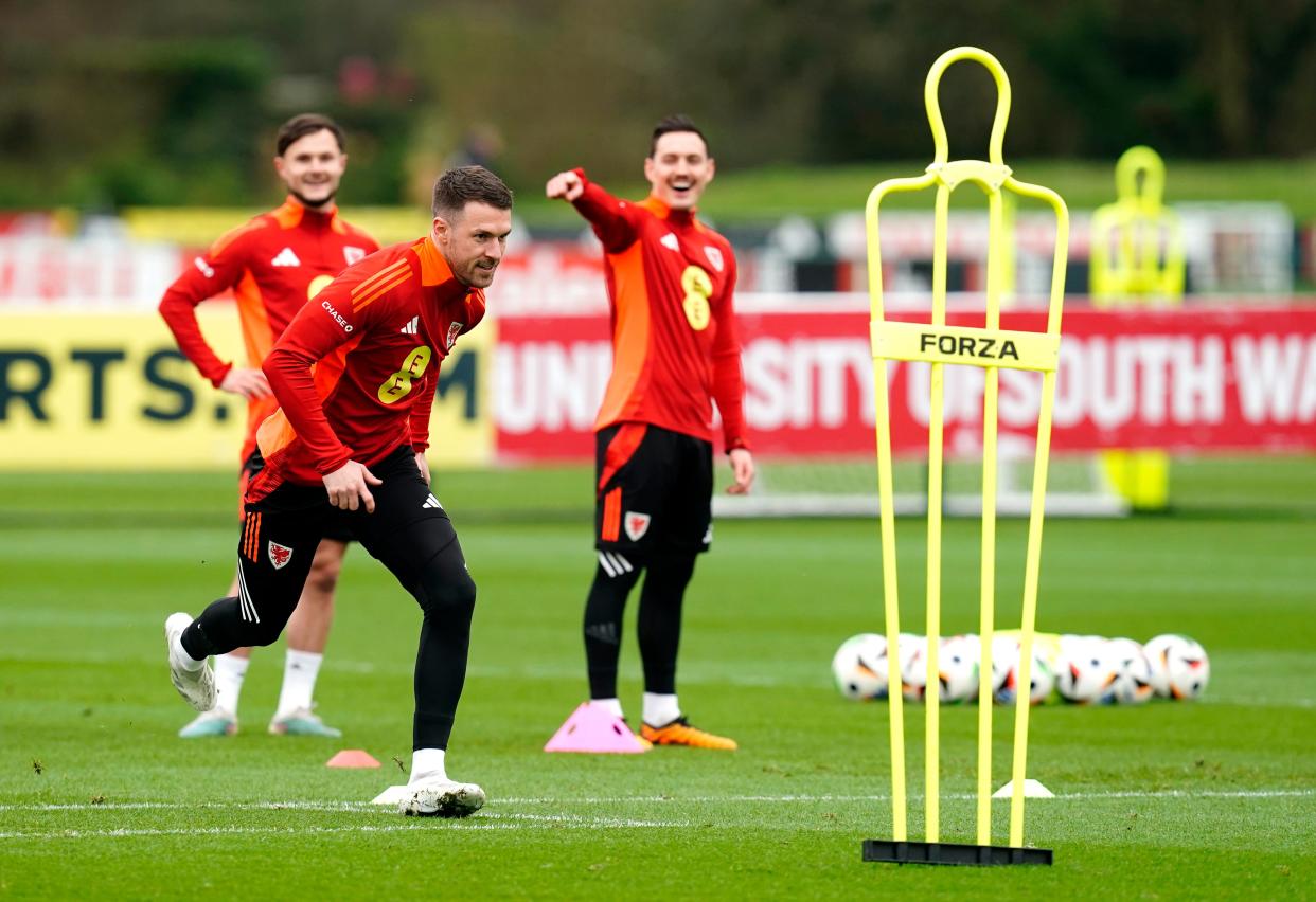 Aaron Ramsey warms up at Vale Resort earlier this week (Nick Potts/PA Wire)
