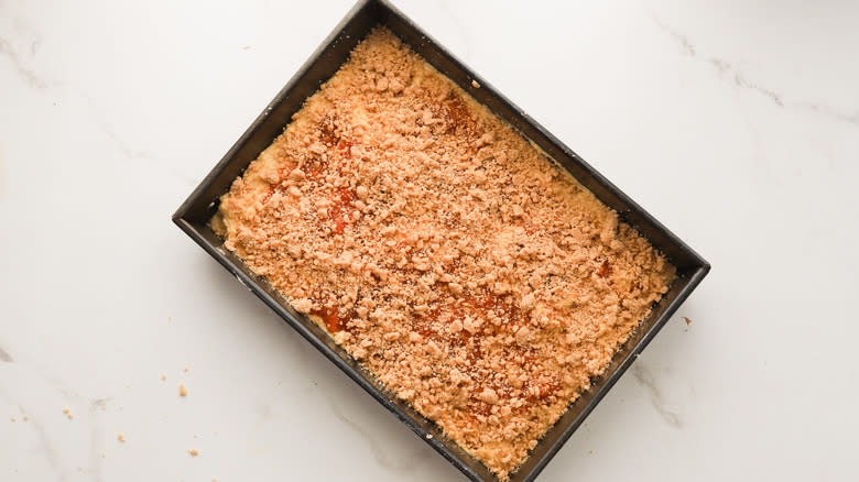 Streusel crumble added to cake
