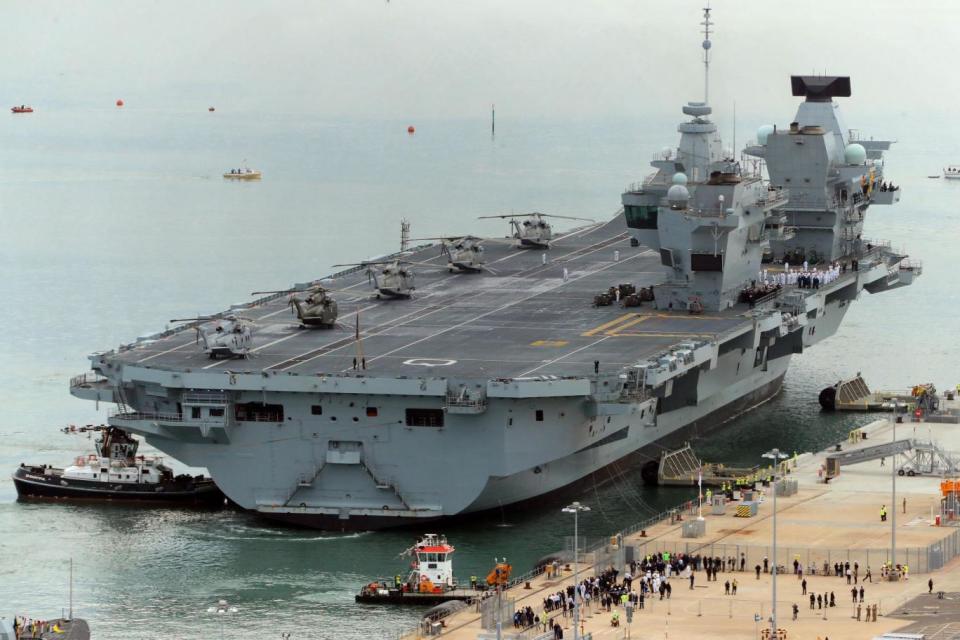 Grand arrival: HMS Queen Elizabeth docks in Portsmouth (PA)(PA)