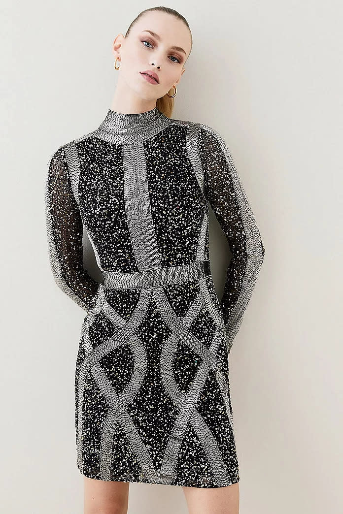 The silver, beaded number is currently discounted in the brand's sale. (Karen Millen)