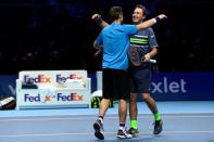 Tennis - ATP World Tour Finals - The O2 Arena, London, Britain - November 19, 2017 Finland's Henri Kontinen and Australia's John Peers celebrate winning the doubles final against Poland's Lukasz Kubot and Brazil's Marcelo Melo Action Images via Reuters/Tony O'Brien