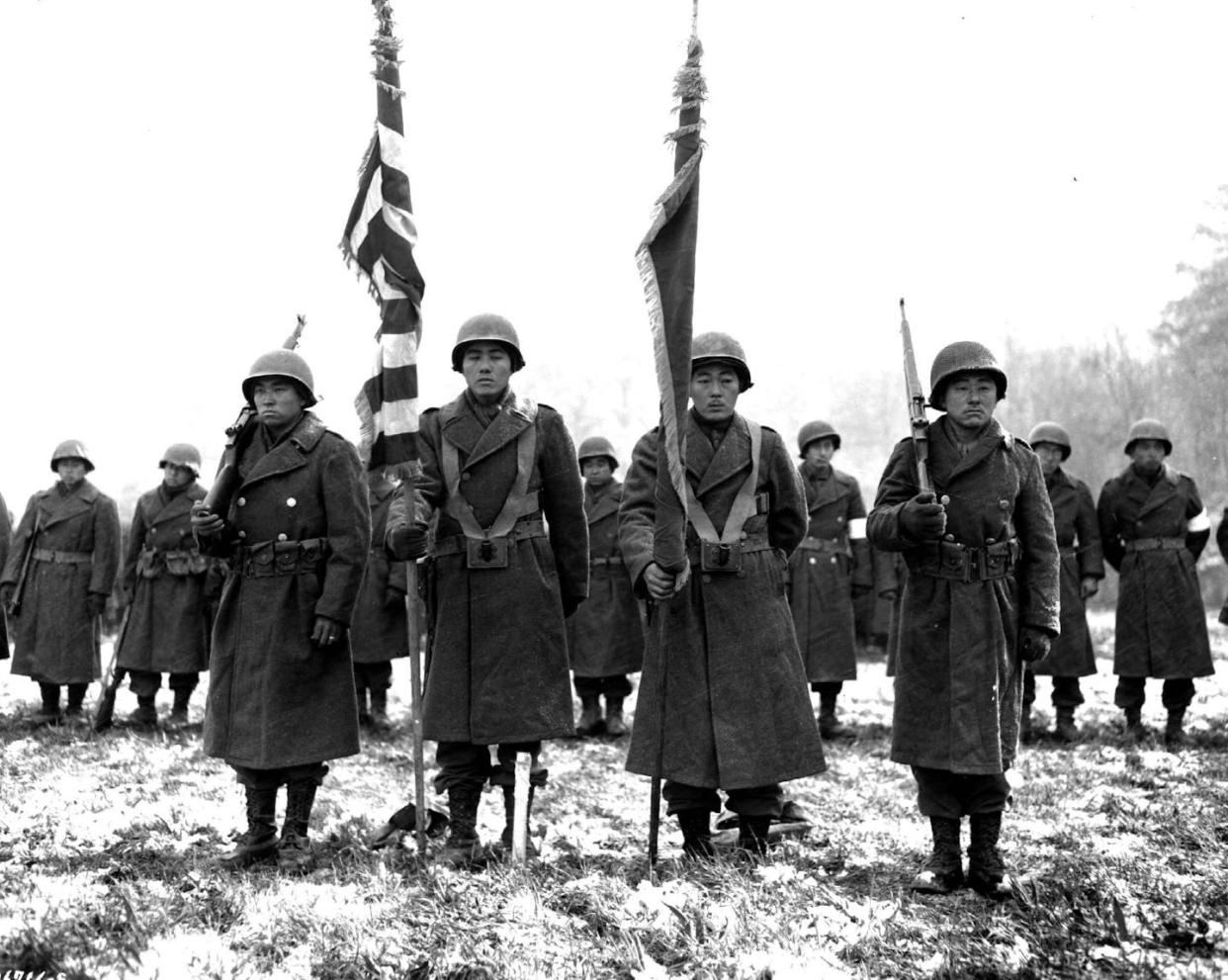 Soldiers of the Japanese American 442nd Regimental Combat Team in Bruyères, France. <a href="https://en.wikipedia.org/wiki/File:442nd_RCT_citation_presentation_in_Bruy%C3%A8res_1944-11-12.jpg" rel="nofollow noopener" target="_blank" data-ylk="slk:U.S. Army Signal Corps via Wikimedia Commons;elm:context_link;itc:0;sec:content-canvas" class="link ">U.S. Army Signal Corps via Wikimedia Commons</a>