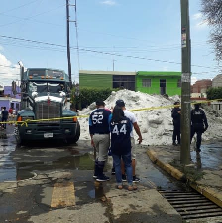Ice is seen on a street after a heavy storm of rain and hail in Guadalajara