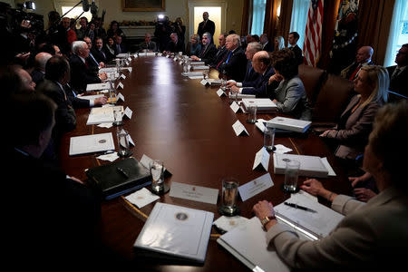 U.S. ‪Vice President Mike Pence‬ addresses comments to U.S. President Donald Trump at the start of a cabinet meeting at the White House in Washington, U.S., December 20, 2017. REUTERS/Jonathan Ernst