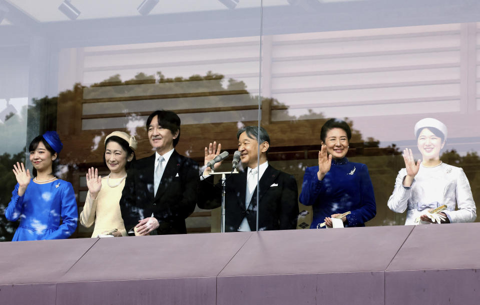 Japanese Emperor Naruhito, third right, accompanied by Empress Masako, second right, Princess Aiko, right, Crown Prince Akishino, third left, Crown Princess Kiko, second left, and Princess Kako, left, waves to well-wishers on the balcony of the Imperial Palace in Tokyo Friday, Feb. 23, 2024. Emperor Naruhito celebrated his 64th birthday. (Yoshikazu Tsuno/Pool Photo via AP)