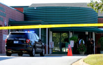 <p>Anderson County sheriff’s deputies and investigators gather outside of Townville Elementary School after a shooting in Townville, S.C., on Sept. 28, 2016. (Nathan Gray/Reuters) </p>