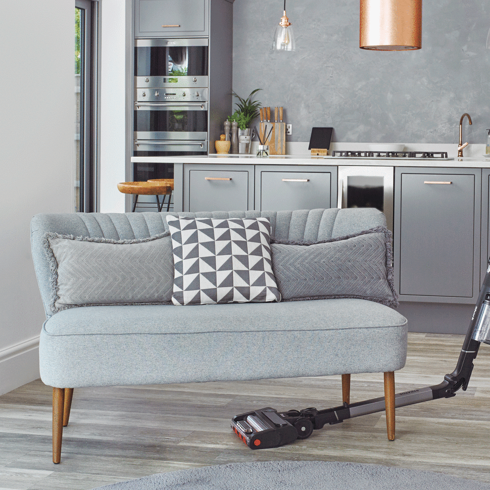 Shark cordless vacuum cleaner under sofa