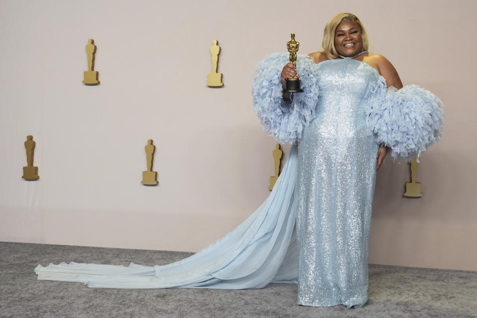 Da'Vine Joy Randolph poses in the press room with the award for best performance by an actress in a supporting role for "The Holdovers" at the Oscars on Sunday, March 10, 2024, at the Dolby Theatre in Los Angeles. (Photo by Jordan Strauss/Invision/AP)