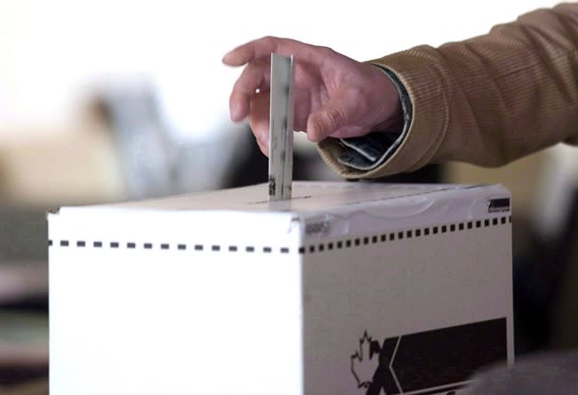 A man casts his vote for the 2011 federal election in Toronto in this May 2, 2011 photo. THE CANADIAN PRESS/Chris Young