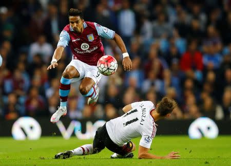 Aston Villa v Manchester United - Barclays Premier League - Villa Park - 14/8/15. Manchester United's Adnan Januzaj in action with Aston Villa's Scott Sinclair Reuters / Darren Staples