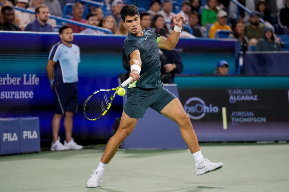 Carlos Alcaraz returns a shot in the first set of the Round of 32 match between Carlos Alcaraz (1) and Jordan Thompson during the Western & Southern Open at the Lindner Family Tennis Center in Mason, Ohio, on Tuesday, Aug. 15, 2023.