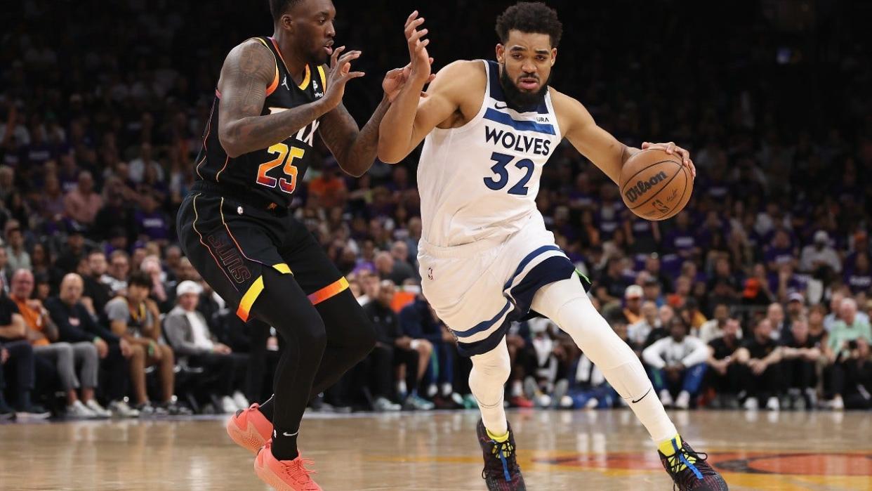 <div>Karl-Anthony Towns #32 of the Minnesota Timberwolves drives the ball against Nassir Little #25 of the Phoenix Sunsduring the first half of game four of the Western Conference First Round Playoffs at Footprint Center on April 28, 2024 in Phoenix, Arizona.</div> <strong>((Photo by Christian Petersen/Getty Images))</strong>