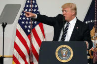 U.S. President Donald Trump delivers remarks at the National Republican Congressional Committee March Dinner in Washington, U.S., March 21, 2017. REUTERS/Carlos Barria