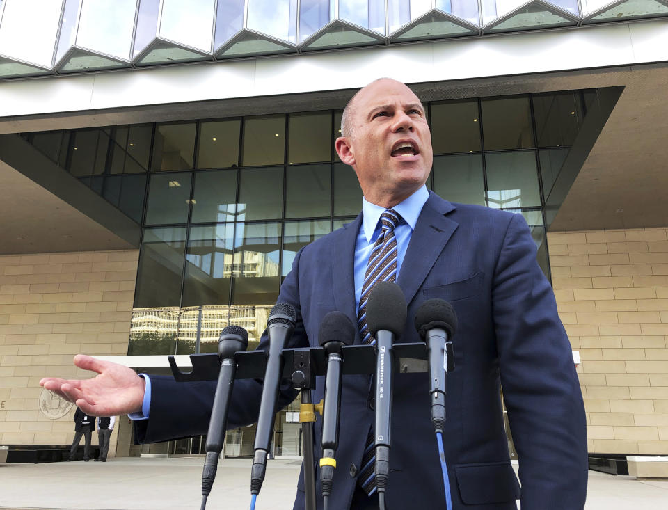 Michael Avenatti, attorney for porn actress Stormy Daniels, talks to reporters outside federal court in Los Angeles, Tuesday, Jan. 22, 2019. A federal judge appeared inclined to toss out a lawsuit against President Donald Trump by Daniels that seeks to tear up a hush-money settlement about their alleged affair. Avenatti argued the case should continue because he wanted to take sworn statements from Trump and Cohen. He plans to ask for legal fees. (AP Photo/Brian Melley)