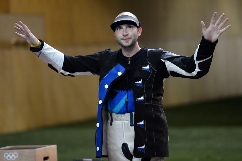 LONDON, ENGLAND - AUGUST 06: Niccolo Campriani of Italy celebrates winning the Gold Medal in the Men's 50m Rifle 3 Positions Shooting Final on Day 10 of the London 2012 Olympic Games at the Royal Artillery Barracks on August 6, 2012 in London, England. (Photo by Lars Baron/Getty Images)