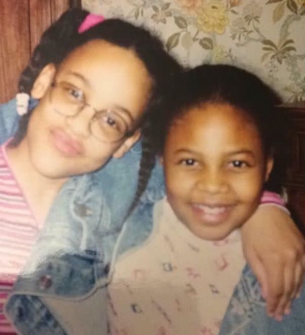 The author (left), at age 12, posing with a childhood friend. (Photo: Courtesy of Amanda J. Calhoun)