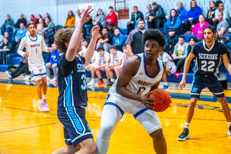 Wareham's Antoine Crosson has his focus on the basket.