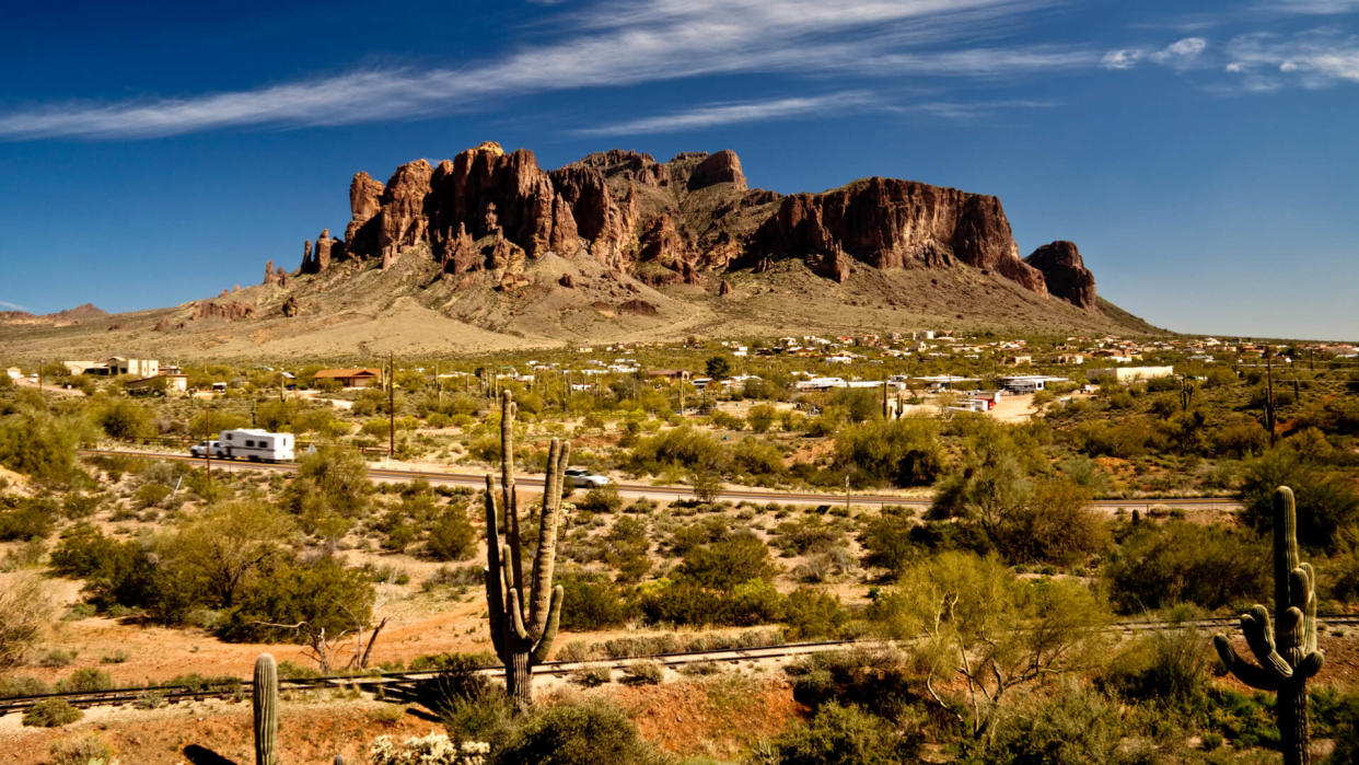 Superstition Mountain as seen from the west over Apache Junction in Arizona.