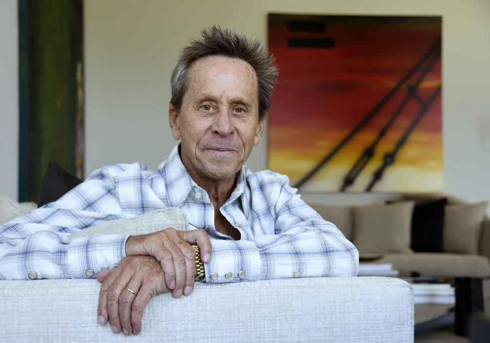 This Aug. 30, 2019 photo shows producer Brian Grazer posing for a portrait at his home in Santa Monica, Calif., to promote his book "Face to Face: The Art of Human Connection." (Photo by Chris Pizzello/Invision/AP)