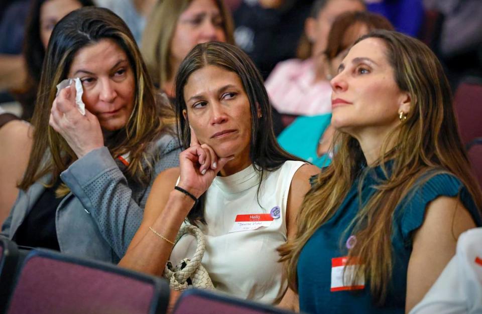 Heather Harris, Denise Vidal and Chelsea Harris-Pentenero, left to right, react during presentations in memory of classmate Shannon Melendi during the 30th Commemorative Senior Safety Assembly sponsored by the Shannon Melendi 30th Commemorative Committee at Southwest Miami Senior High School in Miami, Florida on Tuesday, March 19, 2024. Shannon Melendi was a 1992 Honors Graduate from Southwest Miami Senior High School, attending college at Emory University in Atlanta, Georgia. On March 26, 1994, while on a break from work, Shannon was kidnapped, raped, and murdered by Colvin “Butch” Hinton. Hinton was convicted and sentenced to life in prison in 2005, with the possibility of parole. He is again eligible for parole in January, 2025.