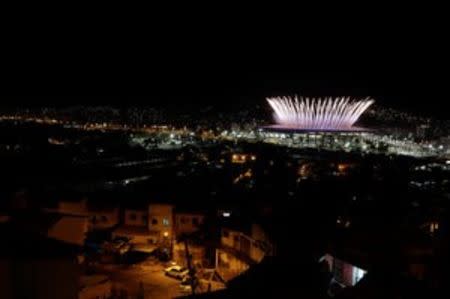 2016 Rio Olympics - Opening Ceremony - Maracana - Rio de Janeiro, Brazil - 05/08/2016. The Maracana Olympic Stadium during the opening ceremony is seen from the Mangueira favela slum. REUTERS/Ricardo Moraes