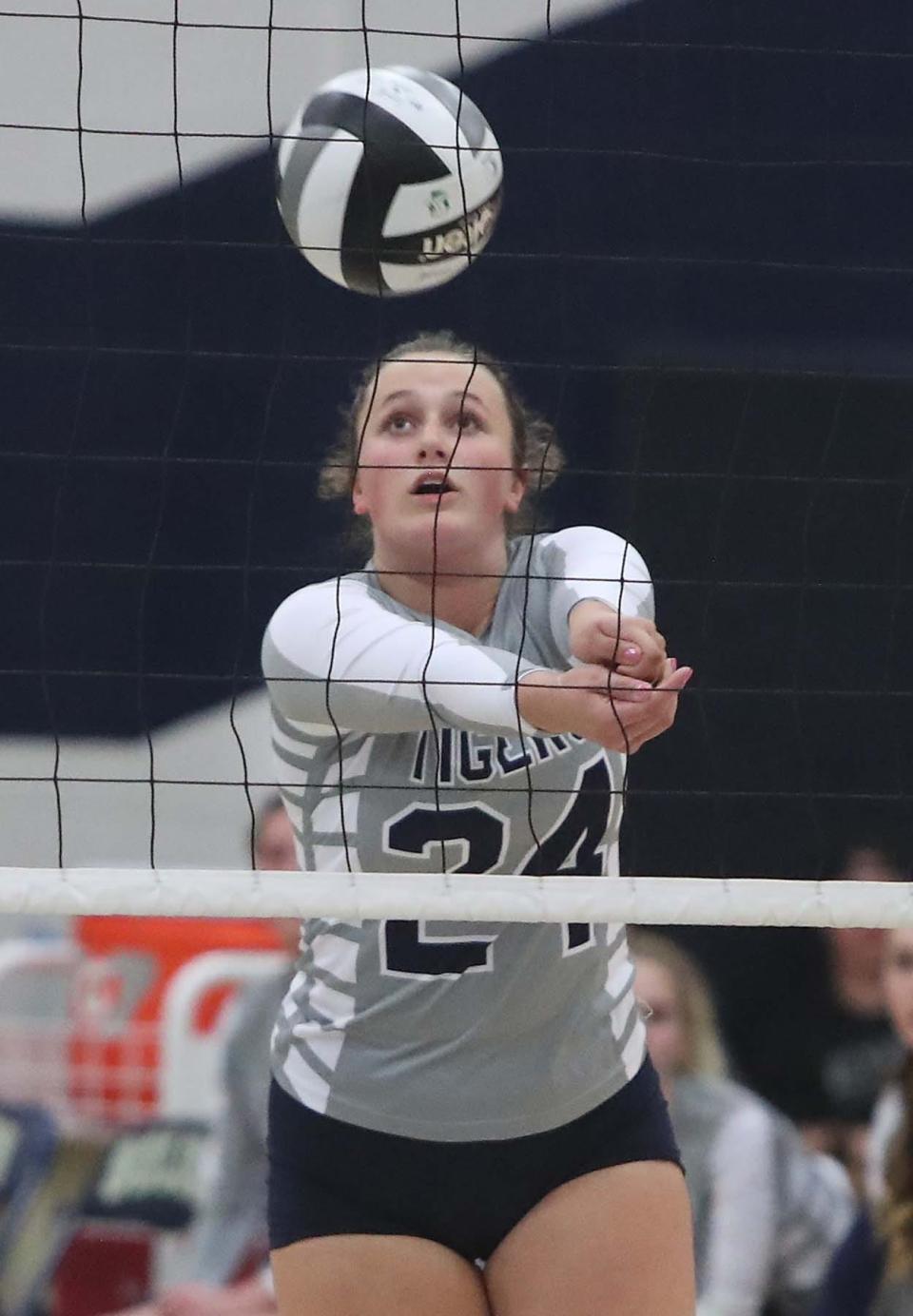 Twinsburg's Julia Rodic keeps the ball in play during Division I  district semifinal against Walsh Jesuit on Oct. 25, 2022, in Solon.