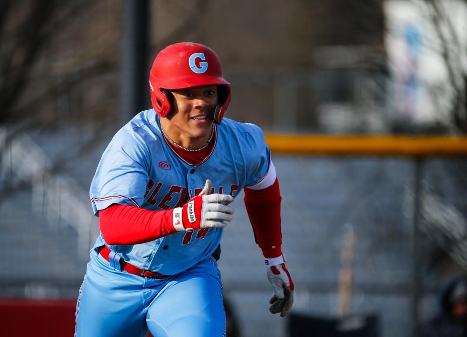 Glendale's Sebastian Norman runs to first base after a hit as the Falcons take on the McDonald County Mustangs on Monday, March 20, 2023.