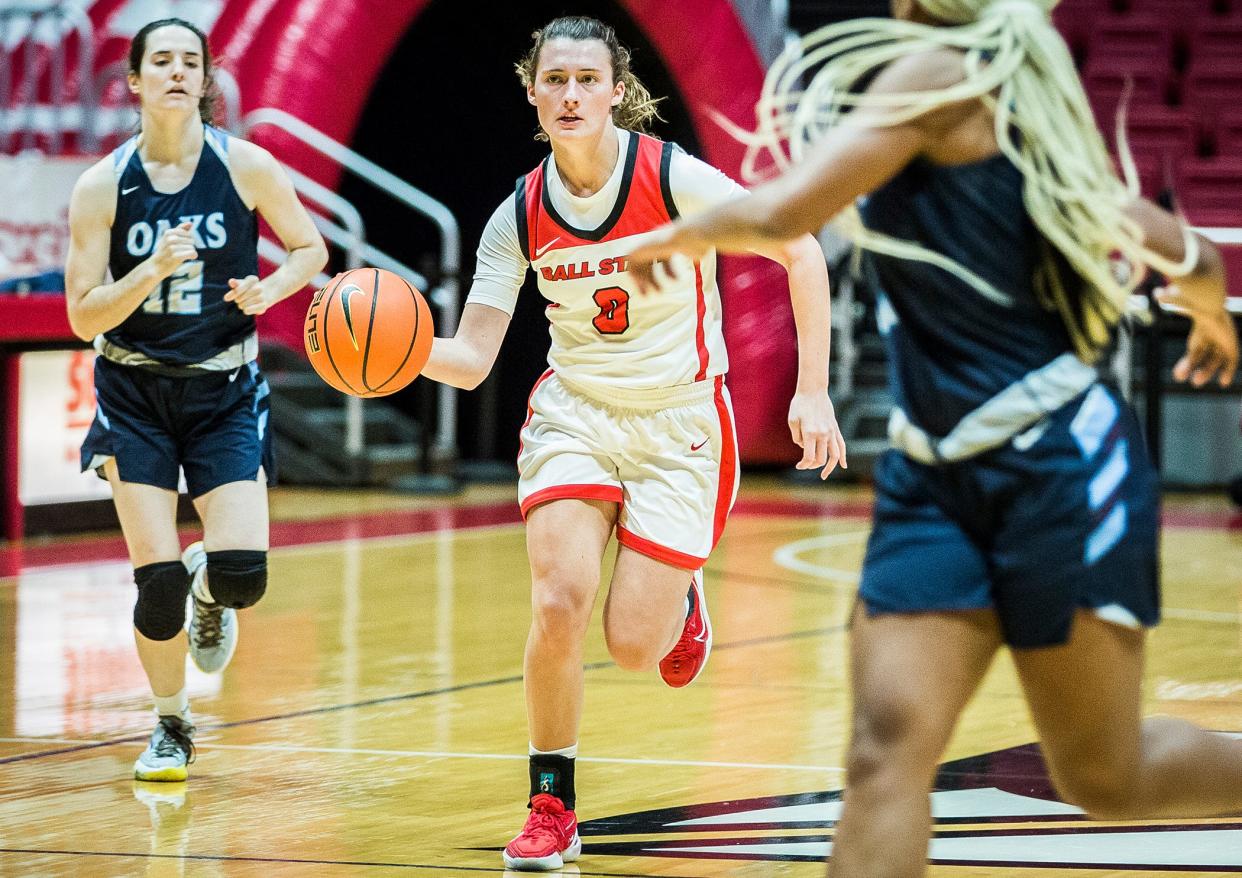 FILE -- Ball State's Ally Becki dribbles the ball up the court during a game against Oakland City at Worthen Arena Wednesday, Nov. 3, 2021.