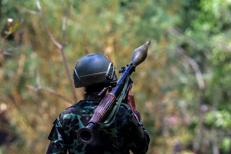 A soldier from the Karen National Liberation Army (KNLA) carries an RPG launcher at a Myanmar military base at Thingyan Nyi Naung village on the outskirts of Myawaddy