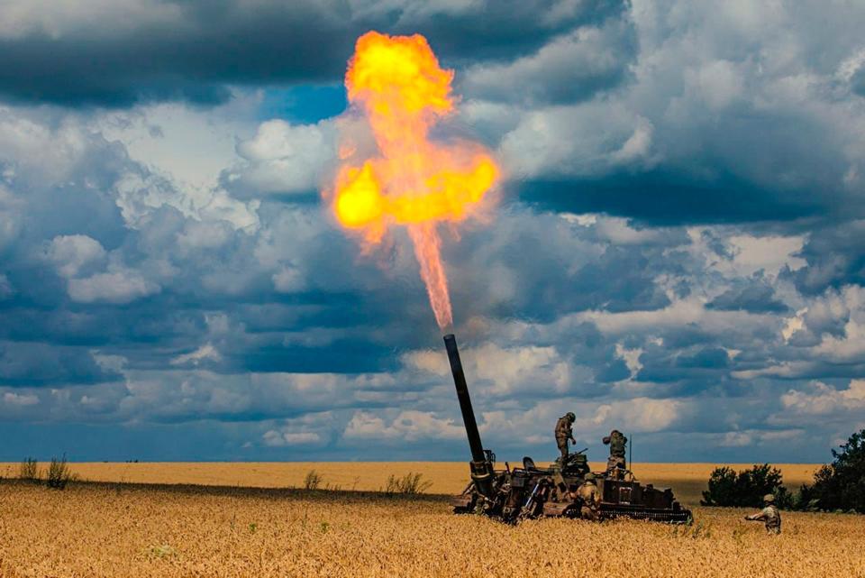 Russian soldiers fire a heavy mortar in Ukraine on 22 July, 2022. (AP)