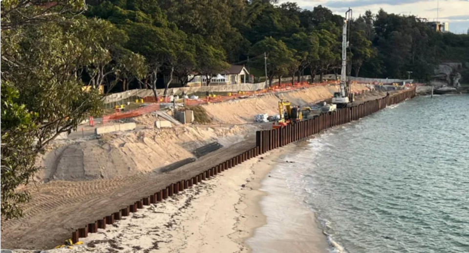 The Shark Beach stone seawall in Sydney under construction.