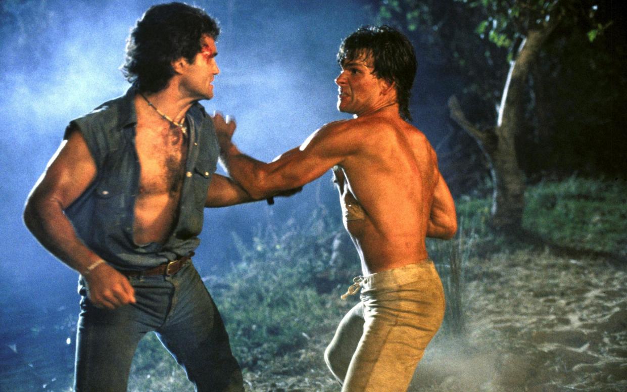 Patrick Swayze, right, with Marshall R Teague in Road House