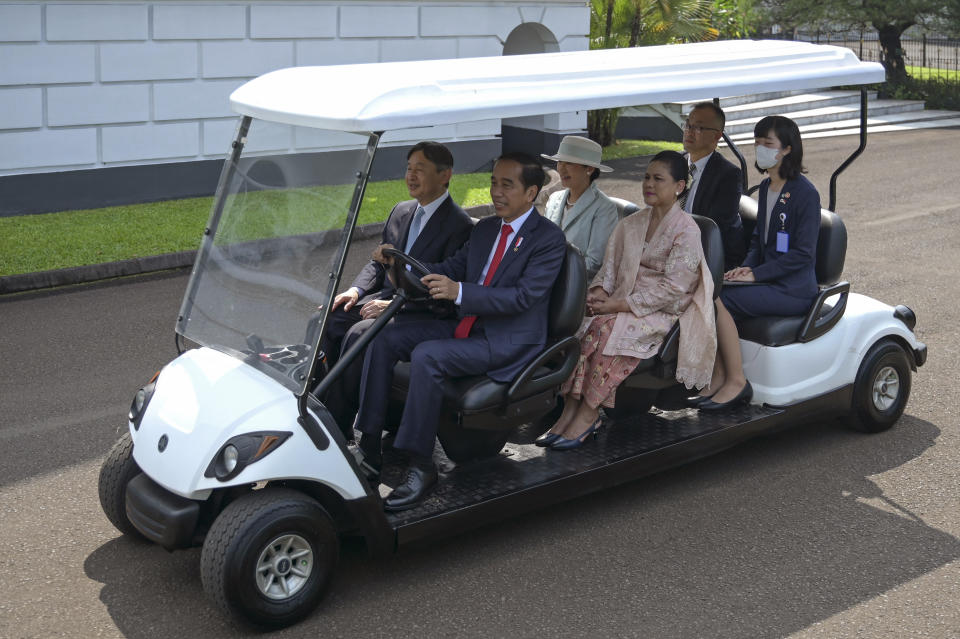 Indonesian President Joko Widodo, second left, drives a golf cart as he gives a ride to Japan's Emperor Naruhito, left, Empress Masako, third left, and Widodo's wife Iriana during their meeting at Bogor Palace in Bogor, West Java, Indonesia, Monday, June 19, 2023. (Bay Ismoyo/Pool Photo via AP)
