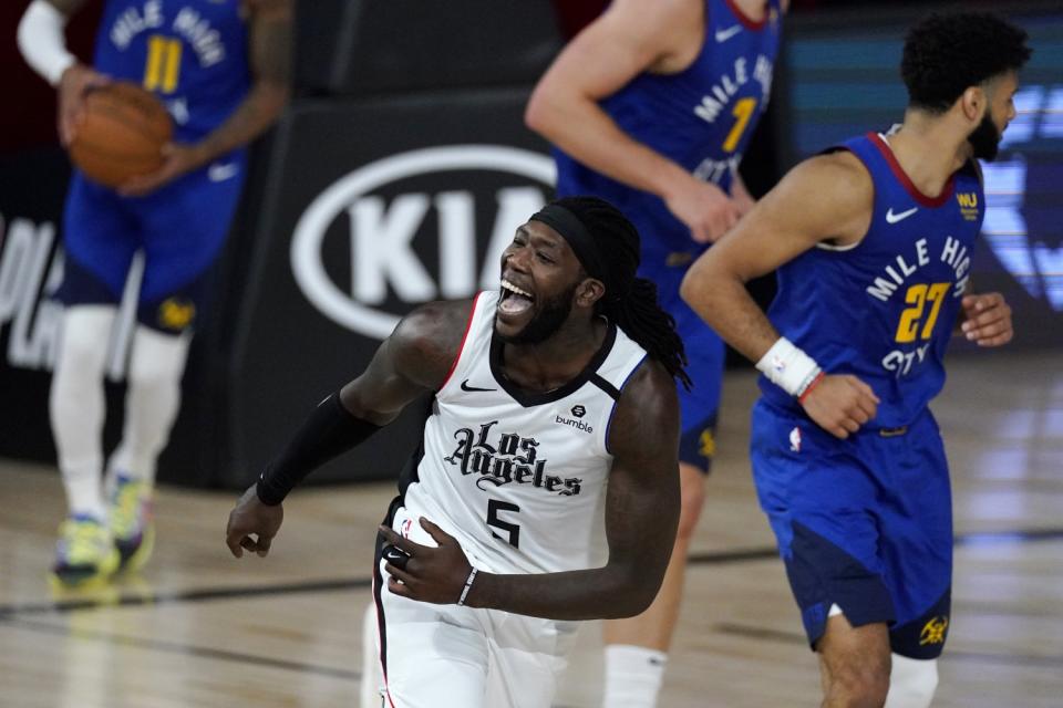 Los Angeles Clippers' Montrezl Harrell reacts after making a basket