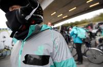 Deliveroo riders demonstrate to push for improved working conditions, in London