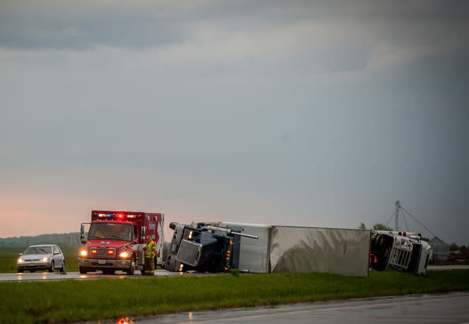 THURMAN, IA - APRIL 14: Several Semi trucks and their trailers are overturned on Interstate 29 April 14, 2012 in Thurman, Iowa. The storms were part of a massive system that affected areas from Northern Nebraska south through Oklahoma.