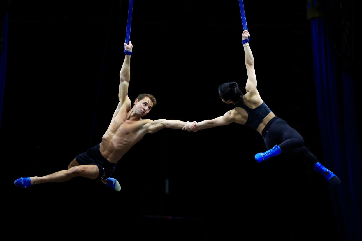 Cirque du Soleil: Corteo comes to Heritage Bank Center this weekend. Pictured: Oleksandr "Sasha" Kunytskyi, left, and Hitomi Kinokuniya perform on the duo straps during practice.