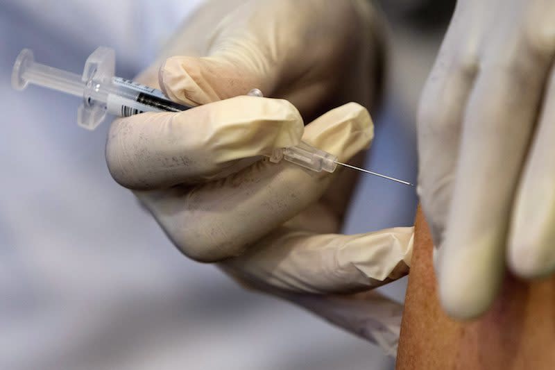 A U.S. study suggests children who receive the flu vaccine are at a lower risk of dying from the flu. Photo from AP.