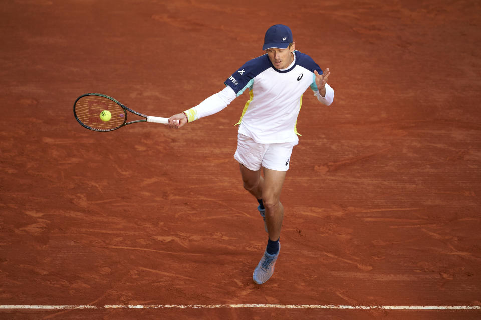 Seen here, Alex de Minaur of Australia plays a forehand against Andrey Rublev of Russia during day four of the Monte Carlo Masters.