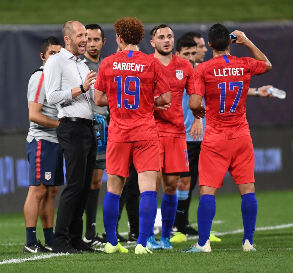 United States head coach Gregg Berhalter (L) gives instructions to forward Josh Sargent during the international friendly football match between the U.S. and Uruguay on Tuesday. (Getty)
