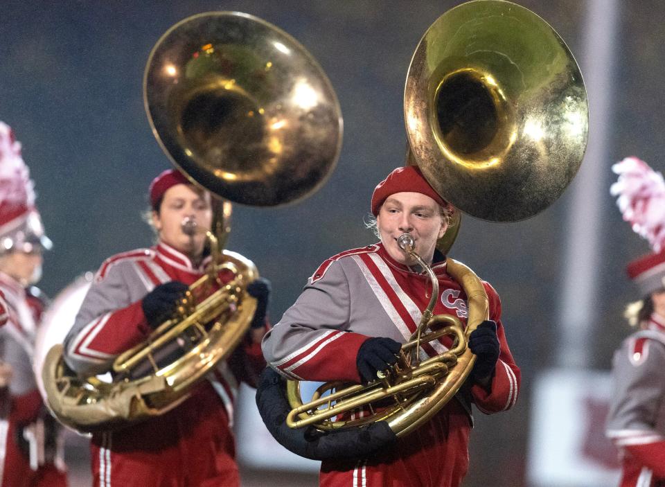 Members of the Canton South marching band perform at halftime of the football team's first-round playoff win last month.