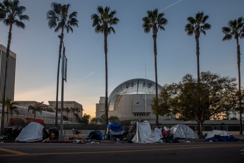 Los Angeles, CA - February 16: Under "Inside Safe" initiative by Mayor Karen Bass people live in the tents behind Academy Museum of Motion Pictures before they were moved to motel on Thursday, Feb. 16, 2023 in Los Angeles, CA. (Irfan Khan / Los Angeles Times)