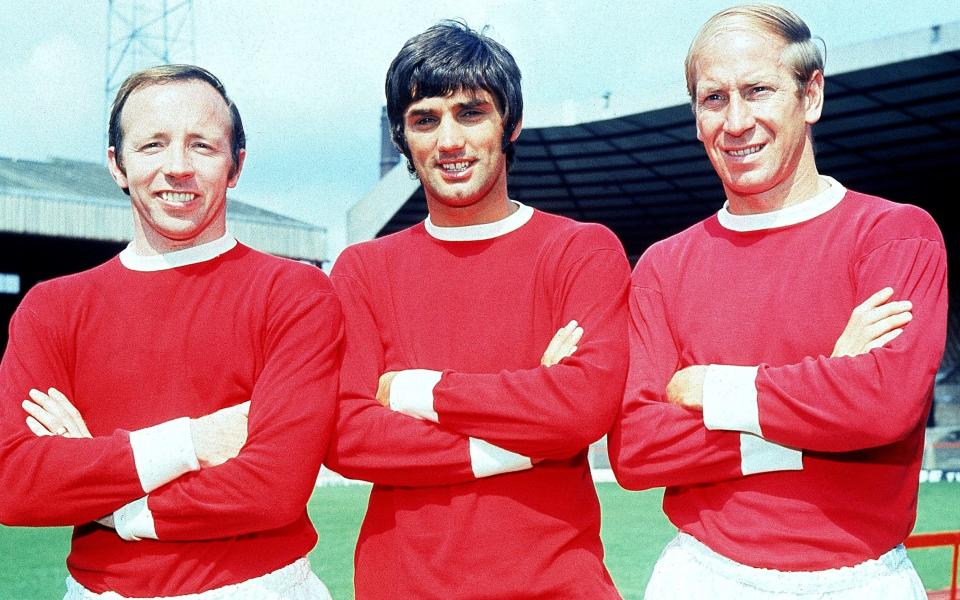 Nobby Stiles, George Best and Bobby Charltonpose for the picture at Old Trafford