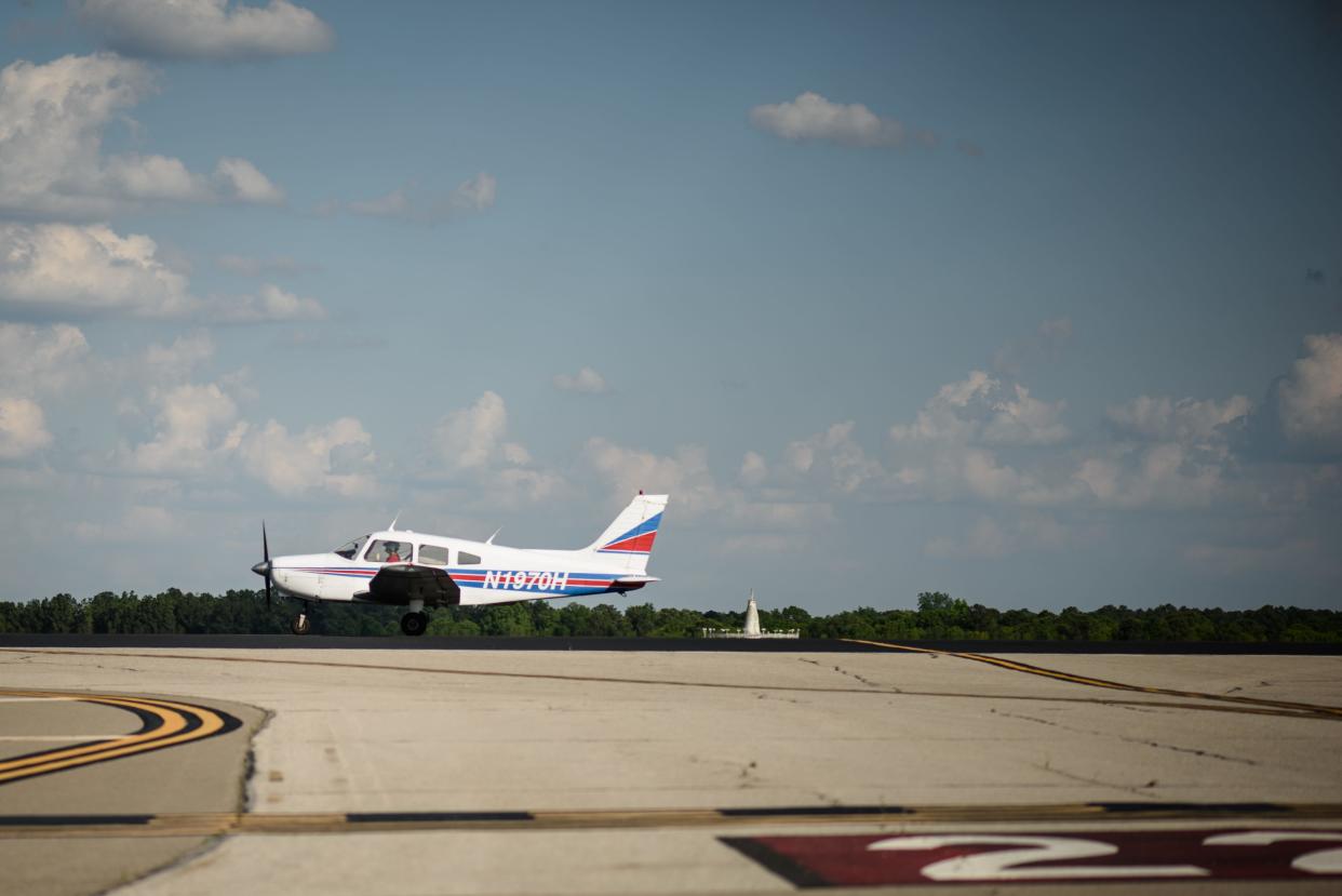 A small plane taxis in after landing at Fayetteville Regional Airport.